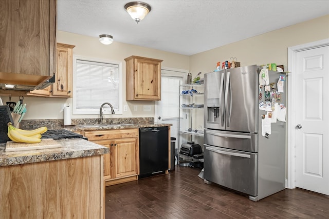 kitchen featuring dishwasher, stainless steel refrigerator with ice dispenser, sink, a textured ceiling, and dark hardwood / wood-style flooring