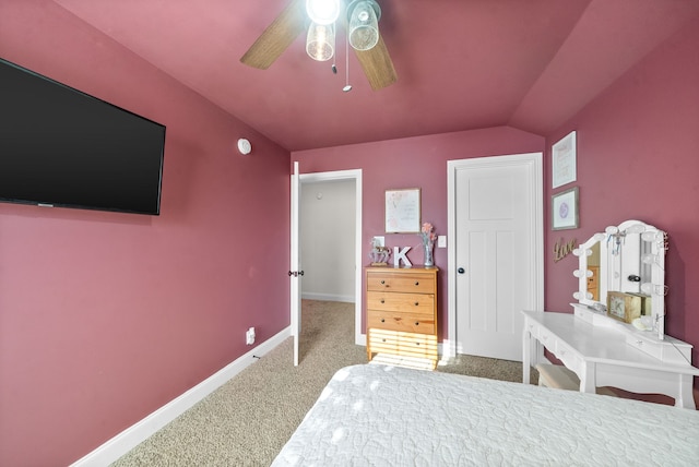 bedroom with vaulted ceiling, carpet, and ceiling fan