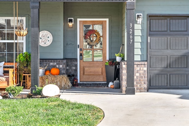 doorway to property featuring a garage