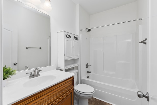 full bathroom featuring shower / bath combination, vanity, and toilet