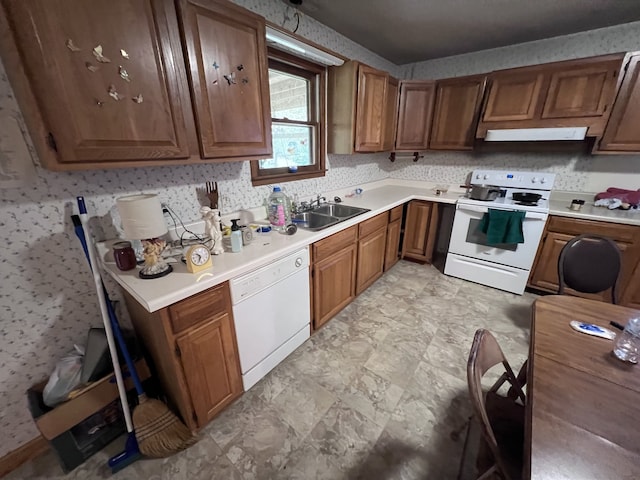 kitchen with sink and white appliances