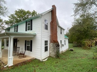 exterior space featuring a lawn