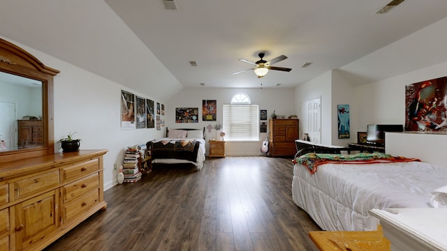 bedroom featuring ceiling fan, vaulted ceiling, and dark wood-type flooring