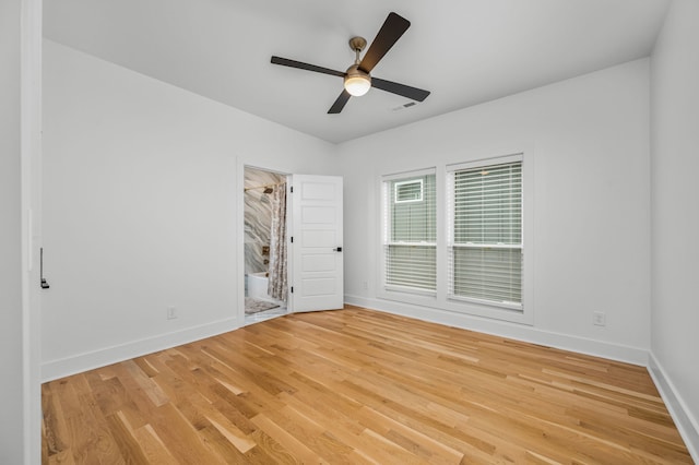 unfurnished bedroom featuring light wood-type flooring and ceiling fan