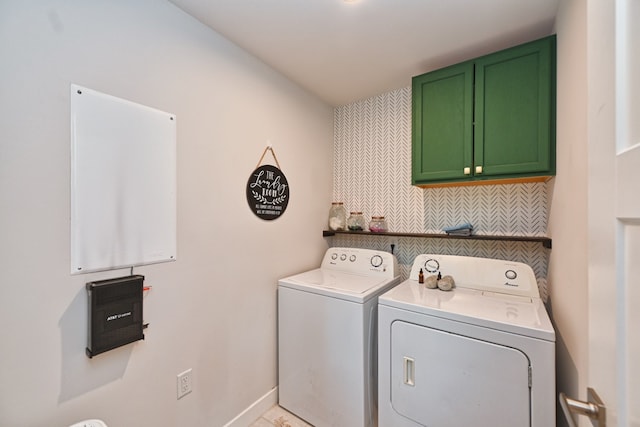 laundry area with cabinets and washing machine and dryer