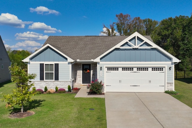 craftsman-style home with a garage and a front lawn