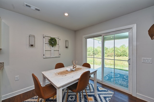 dining room featuring dark wood-type flooring