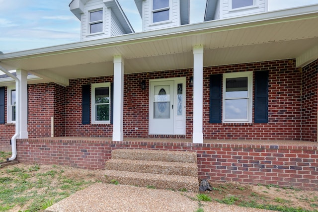 doorway to property with covered porch