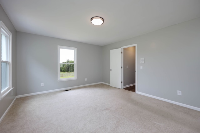 view of carpeted spare room