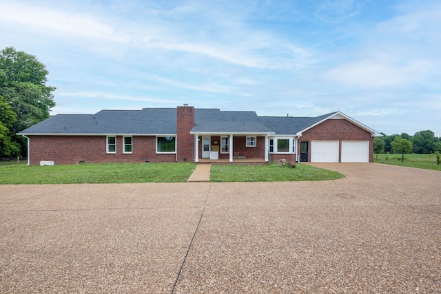 ranch-style house with a front lawn, a porch, and a garage