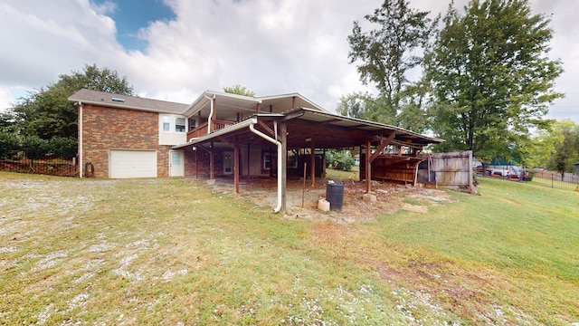 exterior space with a yard and a garage