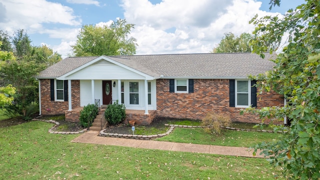 single story home with a front yard