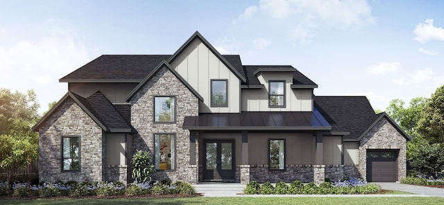 view of front of property featuring a front lawn and a garage