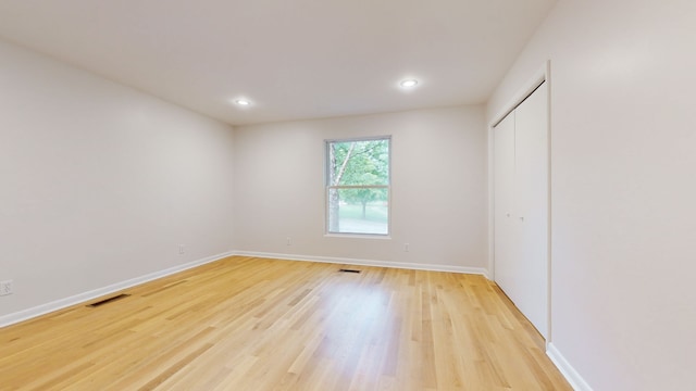 empty room featuring light hardwood / wood-style floors