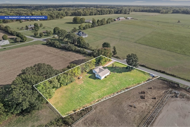 birds eye view of property featuring a rural view