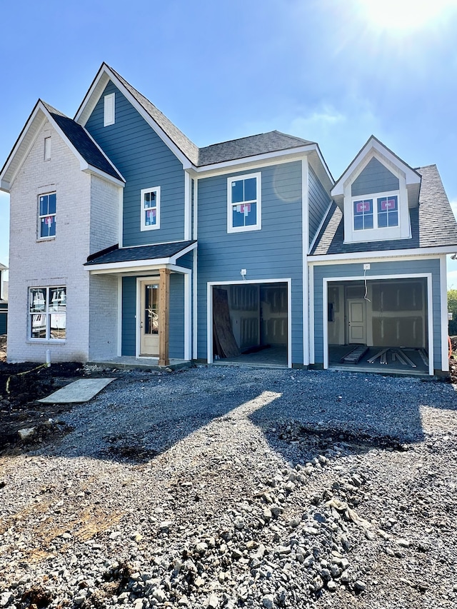 view of front of property with a garage