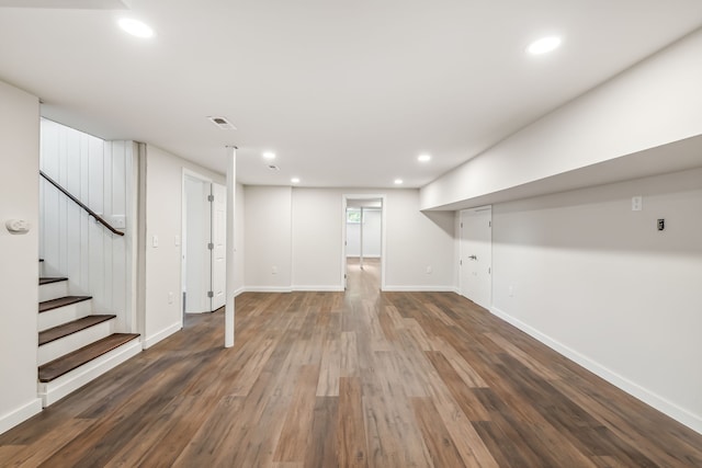 basement featuring dark wood-type flooring