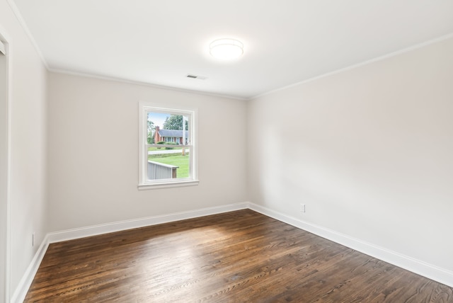 unfurnished room with crown molding and dark hardwood / wood-style flooring