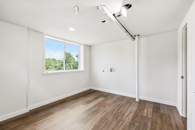 spare room with dark wood-type flooring