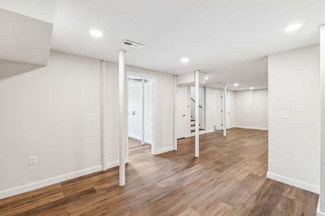 basement featuring hardwood / wood-style flooring