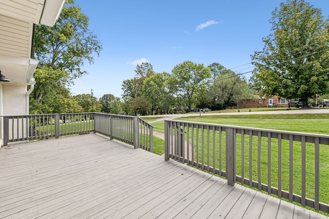 deck featuring a lawn