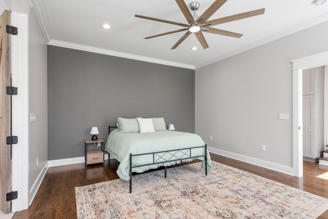 bedroom with ornamental molding, ceiling fan, and dark hardwood / wood-style flooring