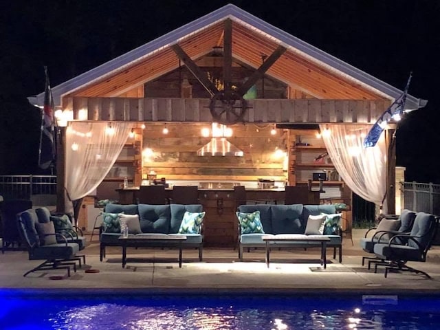 exterior space featuring a gazebo and an outdoor living space