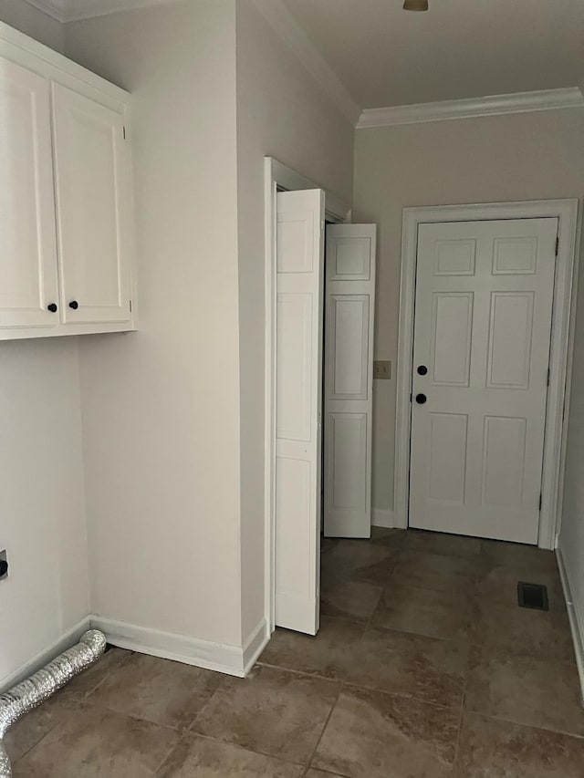 clothes washing area with crown molding and electric dryer hookup