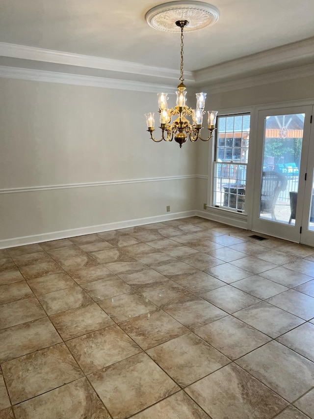 unfurnished dining area featuring a chandelier and ornamental molding