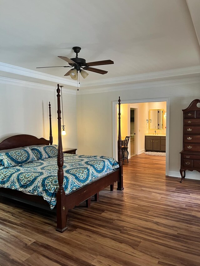 bedroom featuring ceiling fan, connected bathroom, hardwood / wood-style floors, and crown molding