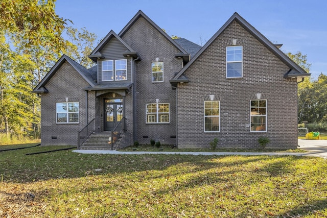 front facade with a front yard