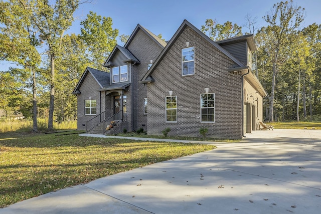 view of property featuring a front yard