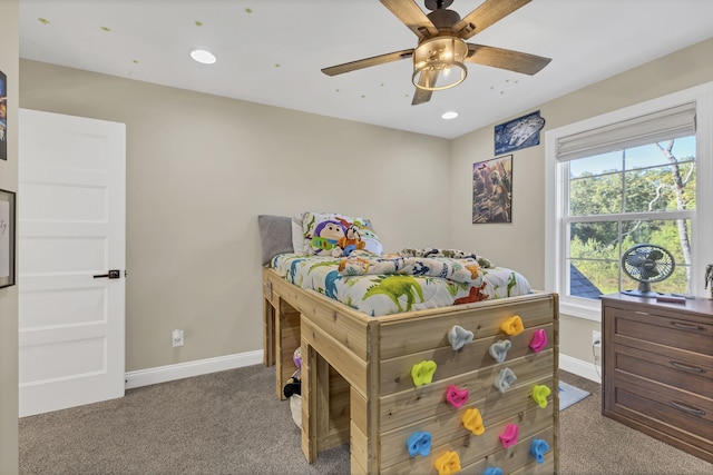 carpeted bedroom featuring ceiling fan