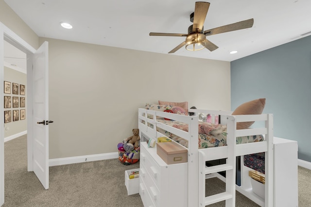 bedroom with ceiling fan and light colored carpet