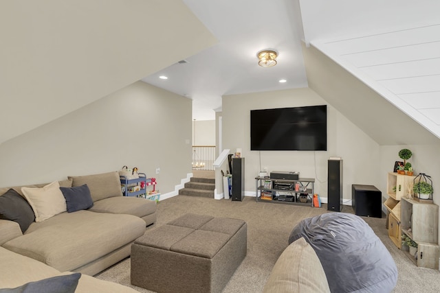 carpeted living room featuring lofted ceiling