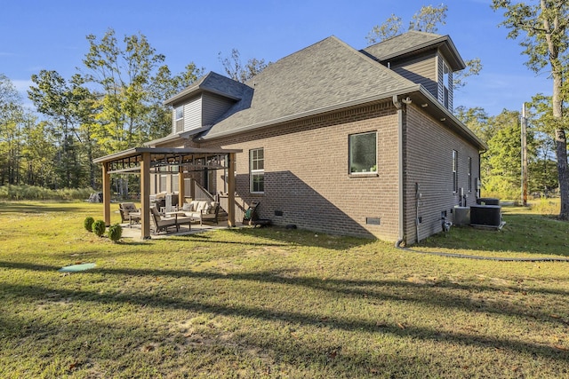 back of house with a yard, a patio, and central AC unit