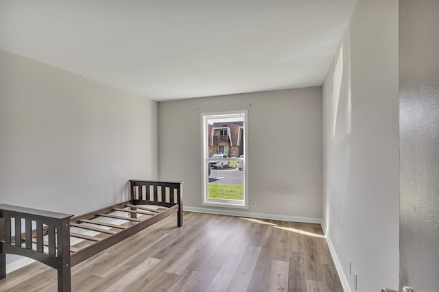 unfurnished bedroom with light hardwood / wood-style floors