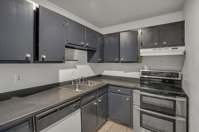 kitchen with gray cabinets, appliances with stainless steel finishes, sink, and light tile patterned flooring