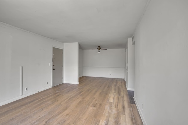 unfurnished room with ceiling fan and light hardwood / wood-style floors