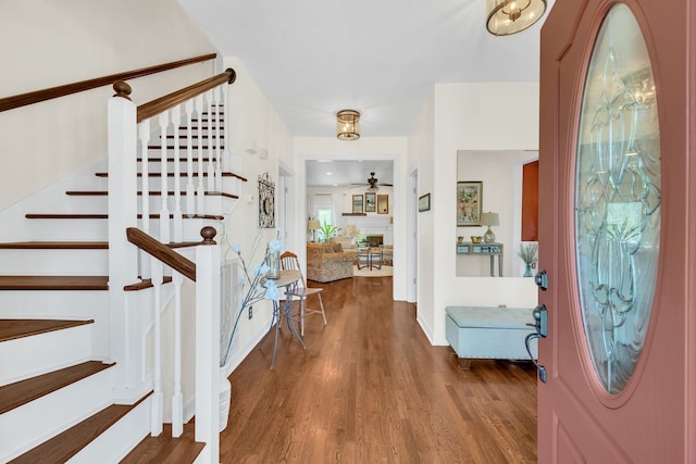 entrance foyer featuring dark hardwood / wood-style floors