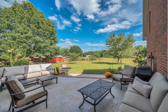 view of patio / terrace featuring a storage shed and outdoor lounge area