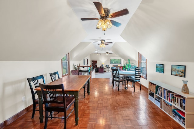 dining area with parquet floors, lofted ceiling, and ceiling fan