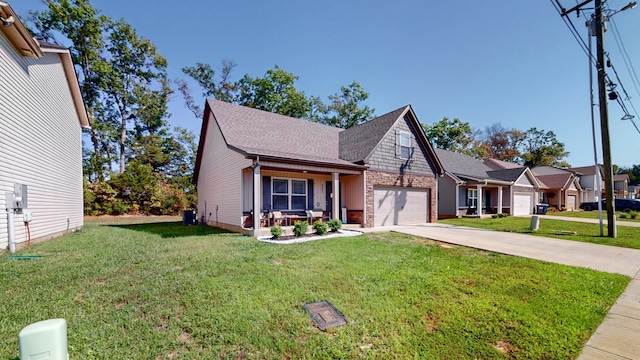 view of front of house with a garage and a front lawn