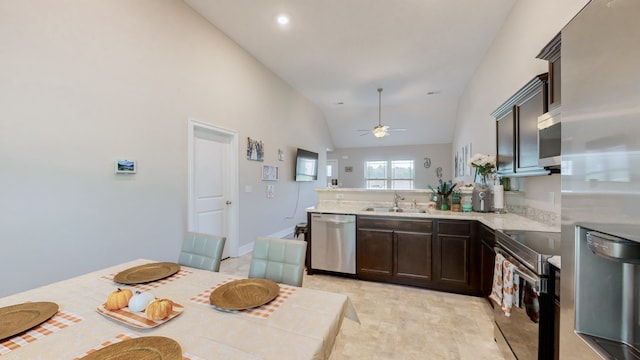 kitchen with dark brown cabinets, sink, high vaulted ceiling, appliances with stainless steel finishes, and ceiling fan