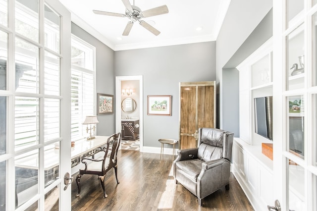 home office with ceiling fan, crown molding, and dark wood-type flooring