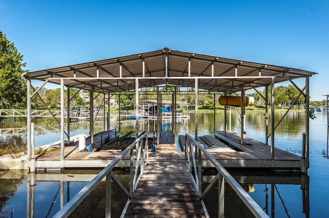 dock area with a water view