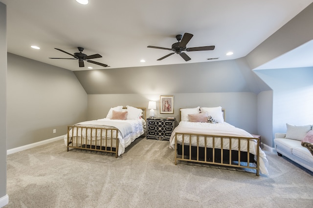 carpeted bedroom featuring vaulted ceiling and ceiling fan