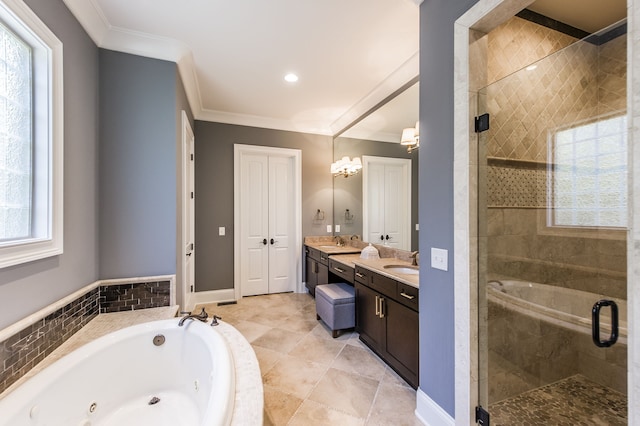 bathroom with independent shower and bath, vanity, crown molding, and a wealth of natural light