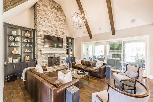 living room featuring beamed ceiling, a stone fireplace, dark wood-type flooring, high vaulted ceiling, and an inviting chandelier