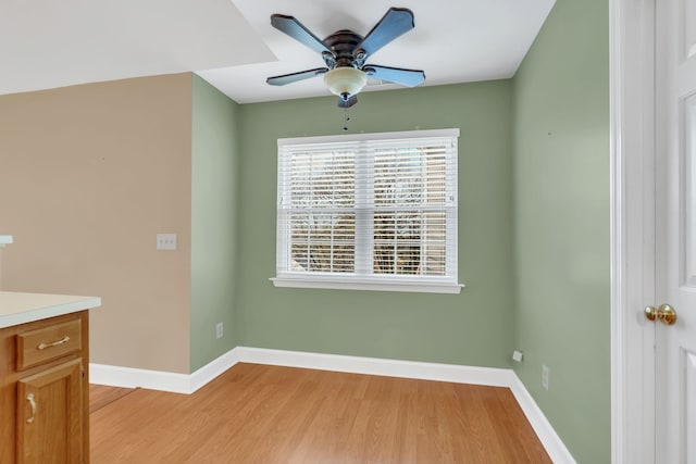 interior space featuring light hardwood / wood-style floors and ceiling fan